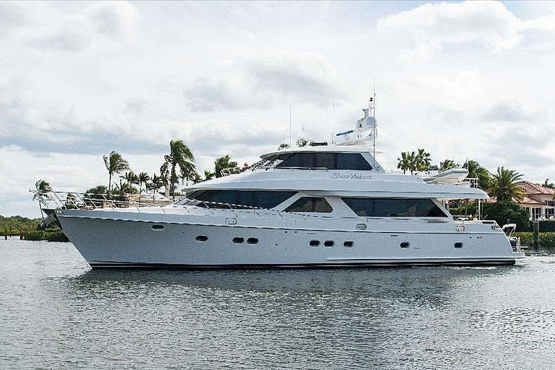 a white yacht on the water aboard MI AMOR II Yacht for Sale