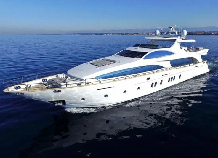 a white yacht on the water aboard WHITE PEARL Yacht for Sale