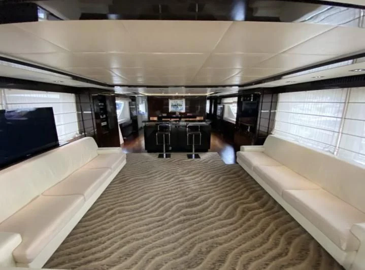 inside of a building with a large bed and desks aboard WHITE PEARL Yacht for Sale