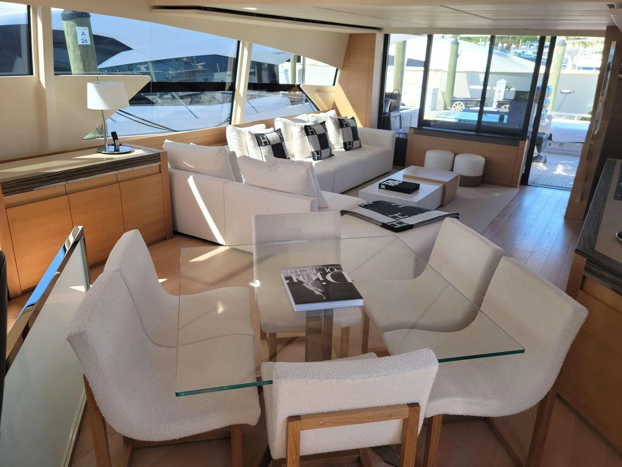 a room with a couch and a table aboard 92 PERSHING Yacht for Sale