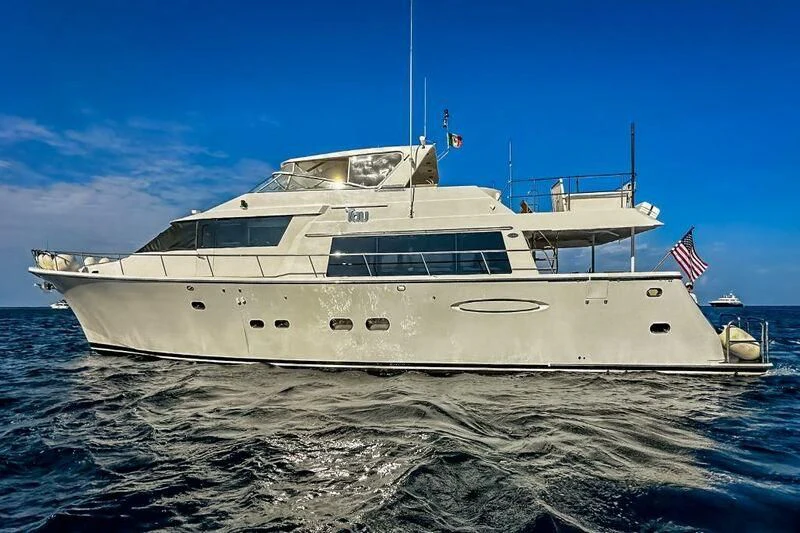 a large white yacht in the water aboard JULE Yacht for Sale