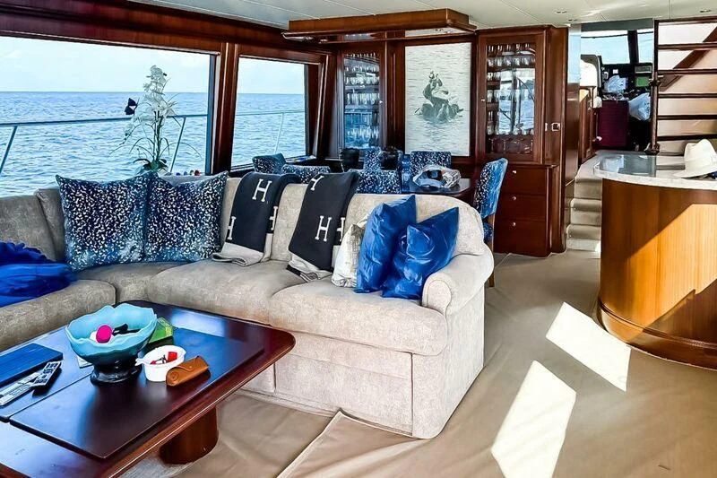 a living room with a large window aboard JULE Yacht for Sale
