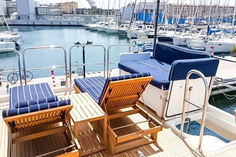 a group of chairs on a boat aboard JULE Yacht for Sale