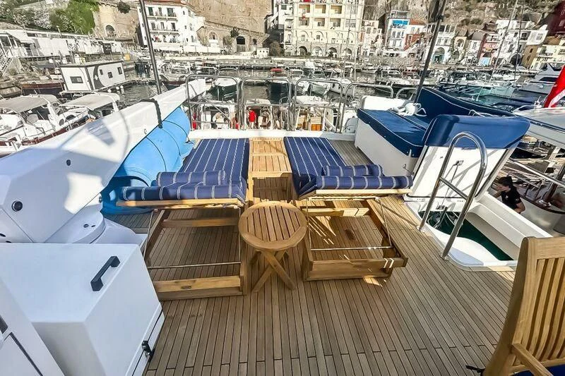 a deck with many boats aboard JULE Yacht for Sale