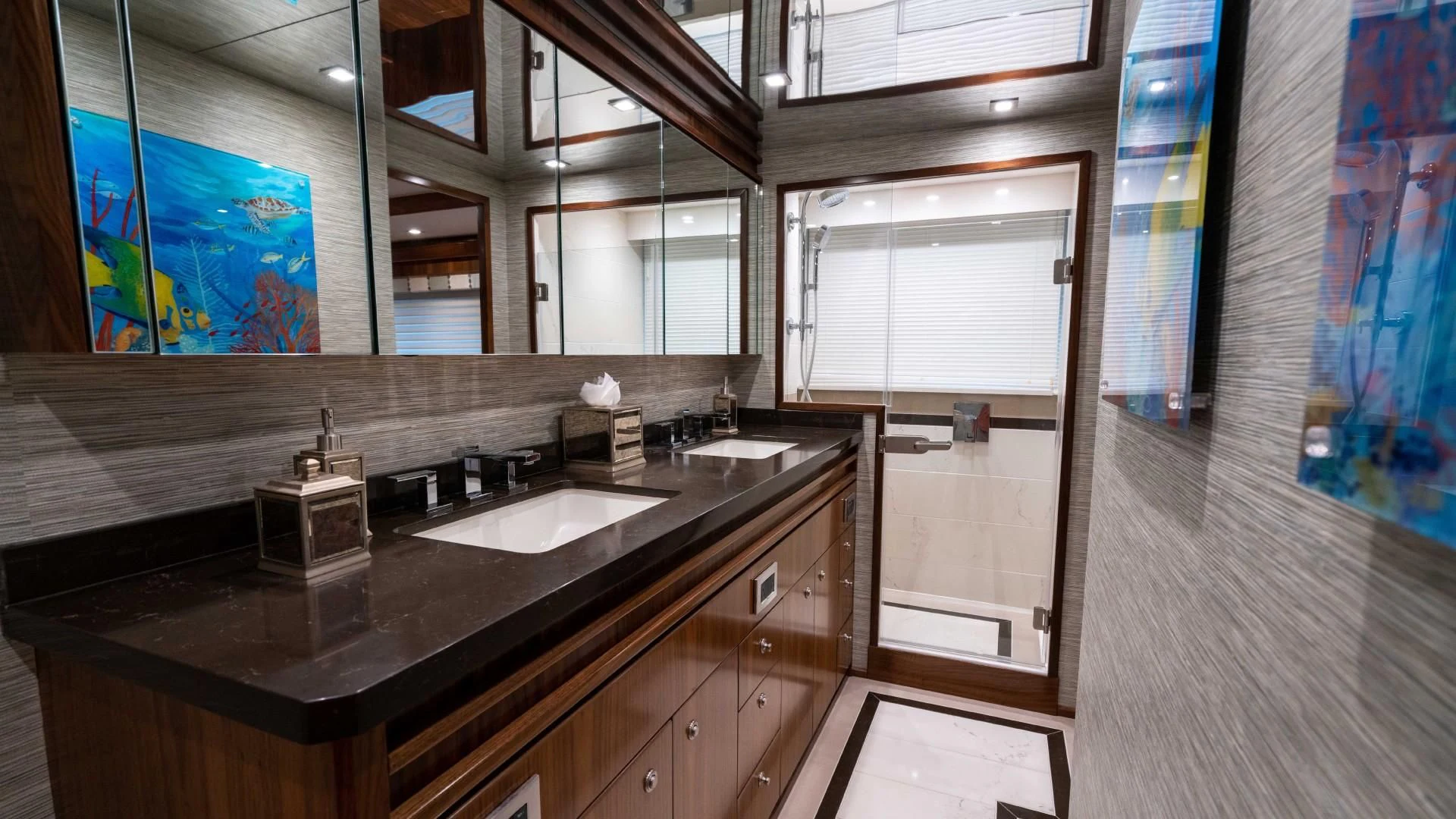 a bathroom with sinks and mirrors aboard OBSESSION Yacht for Sale