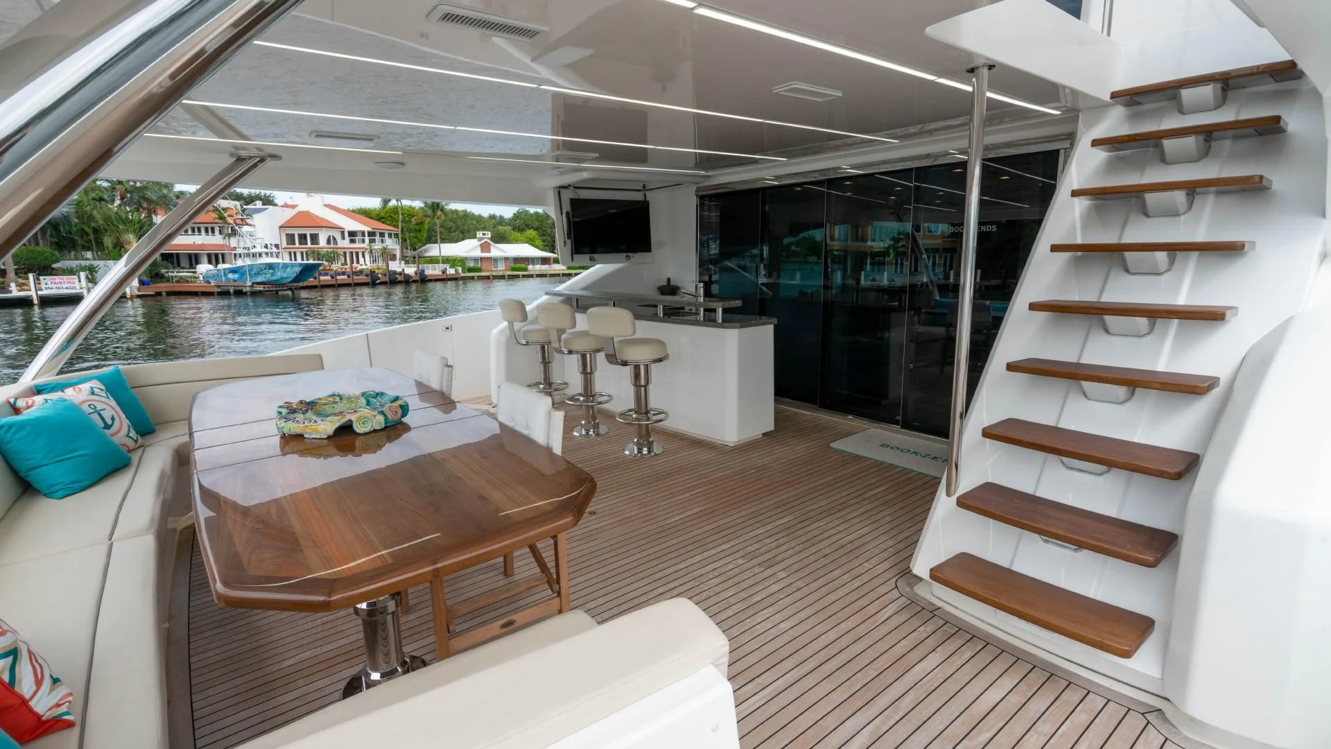 a room with a table and chairs aboard OBSESSION Yacht for Sale