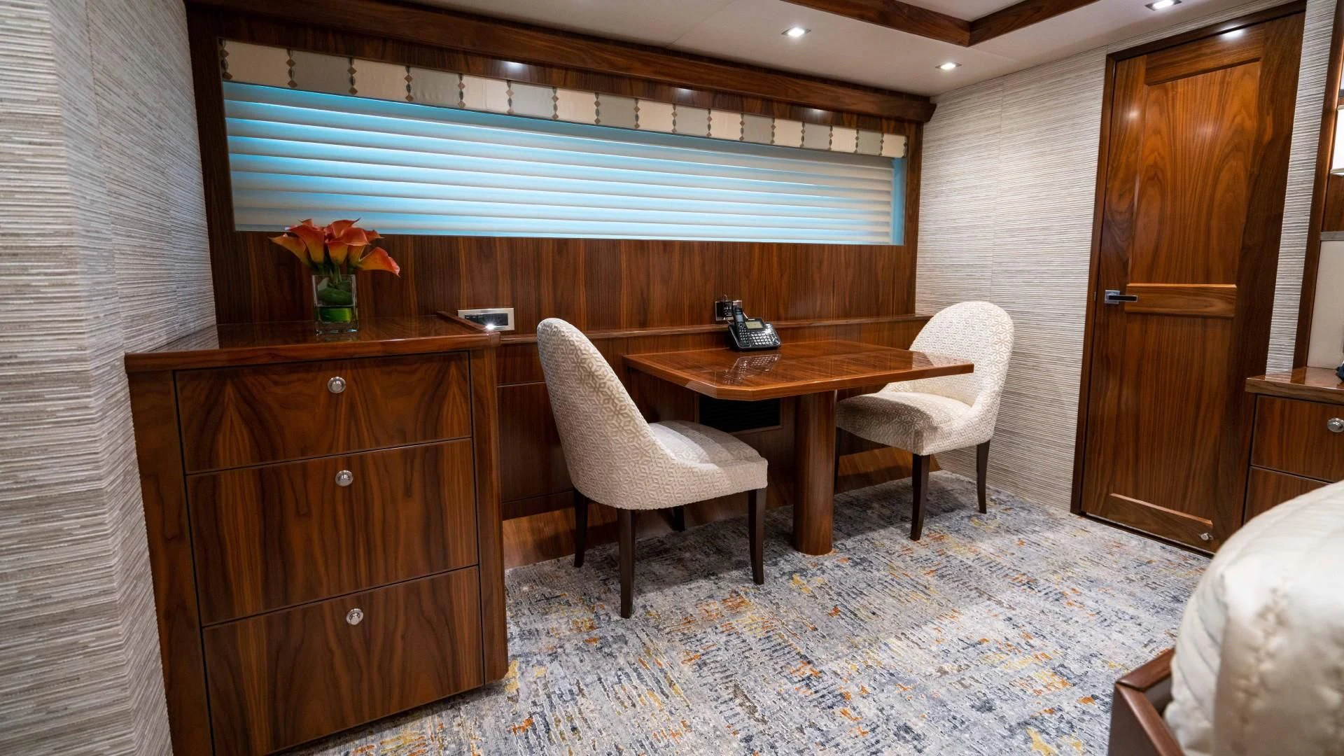 a room with a table and chairs aboard OBSESSION Yacht for Sale