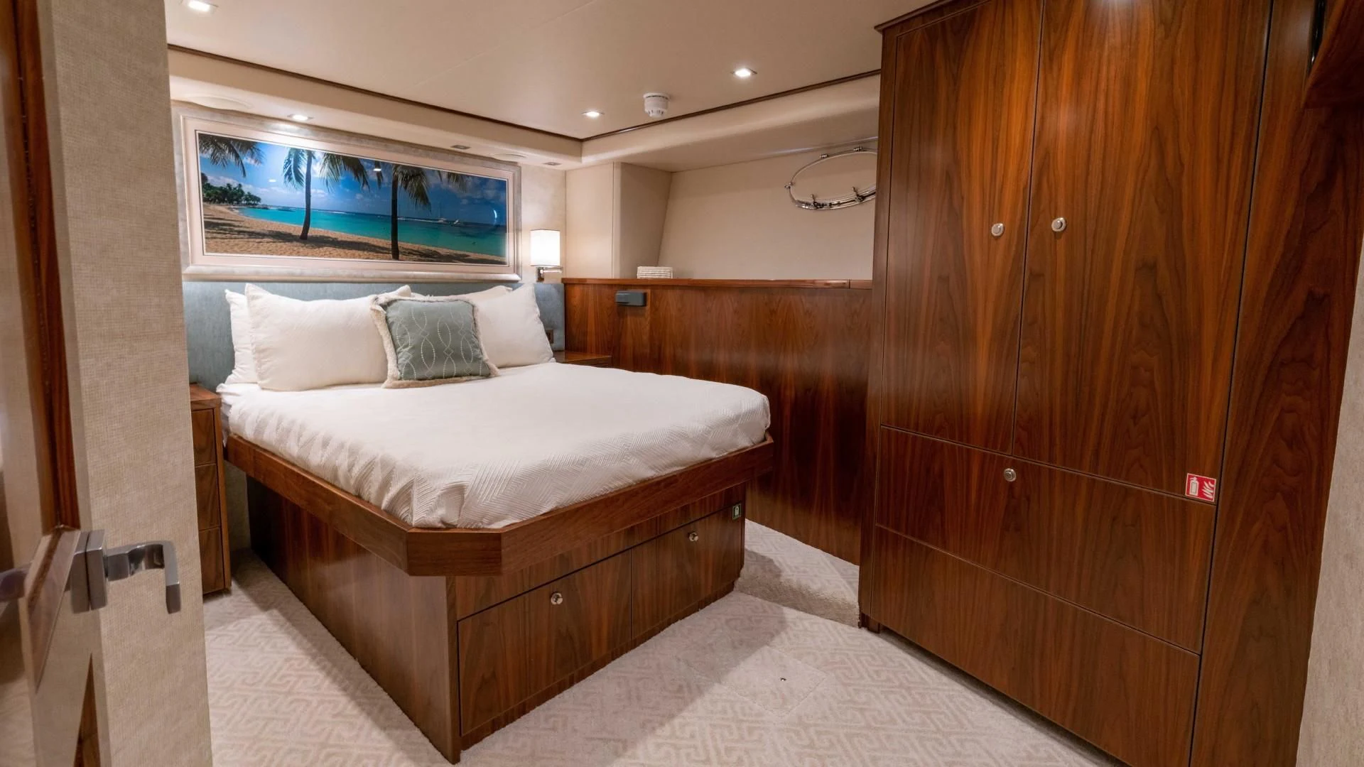 a bed in a room aboard OBSESSION Yacht for Sale