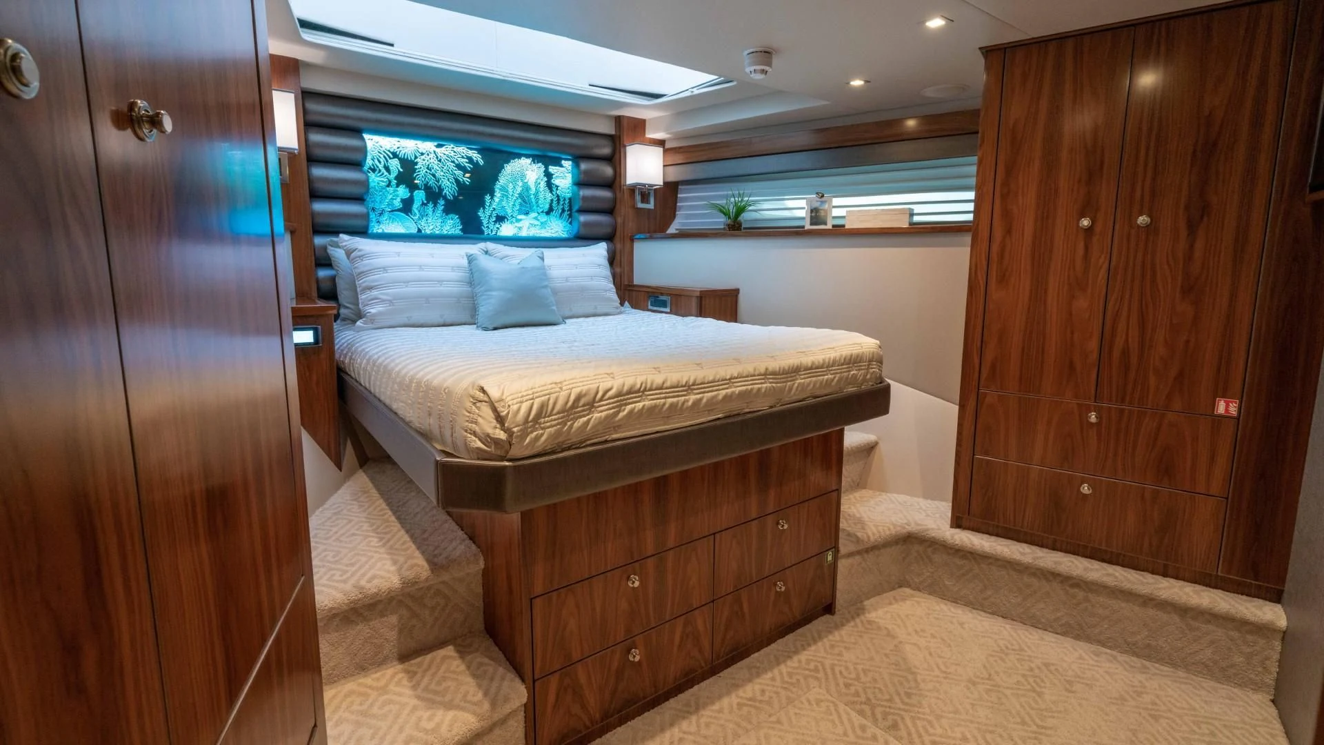 a bed in a room aboard OBSESSION Yacht for Sale