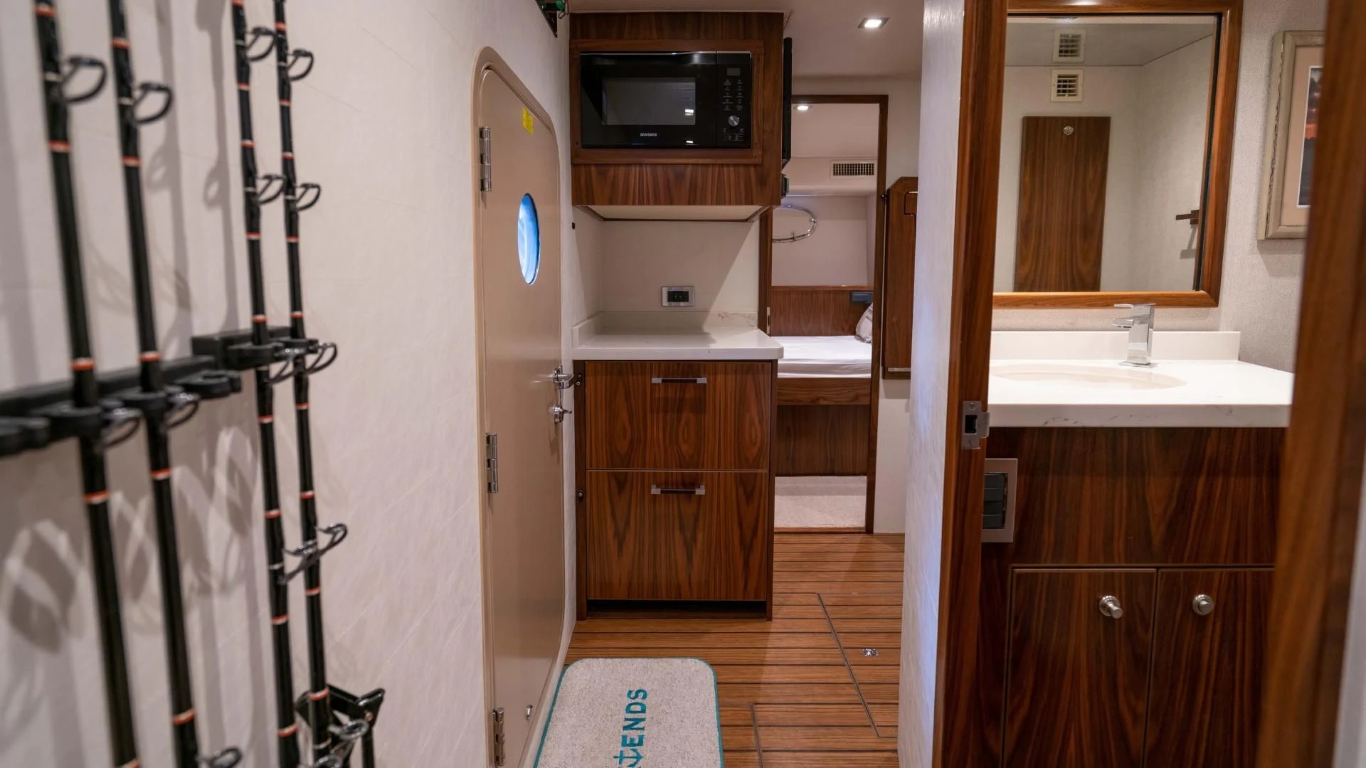 a bathroom with a black shower unit aboard OBSESSION Yacht for Sale