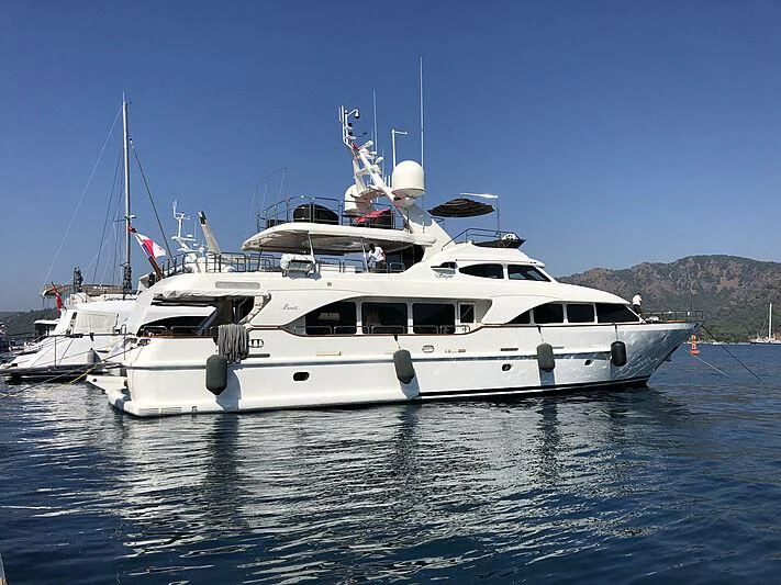 a white yacht in the water aboard SOGNO Yacht for Sale