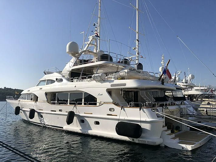 a white yacht in the water aboard SOGNO Yacht for Sale