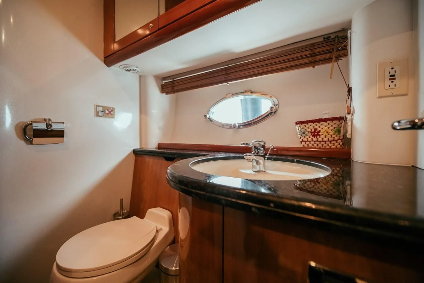 a bathroom with a large mirror aboard HOURI Yacht for Sale