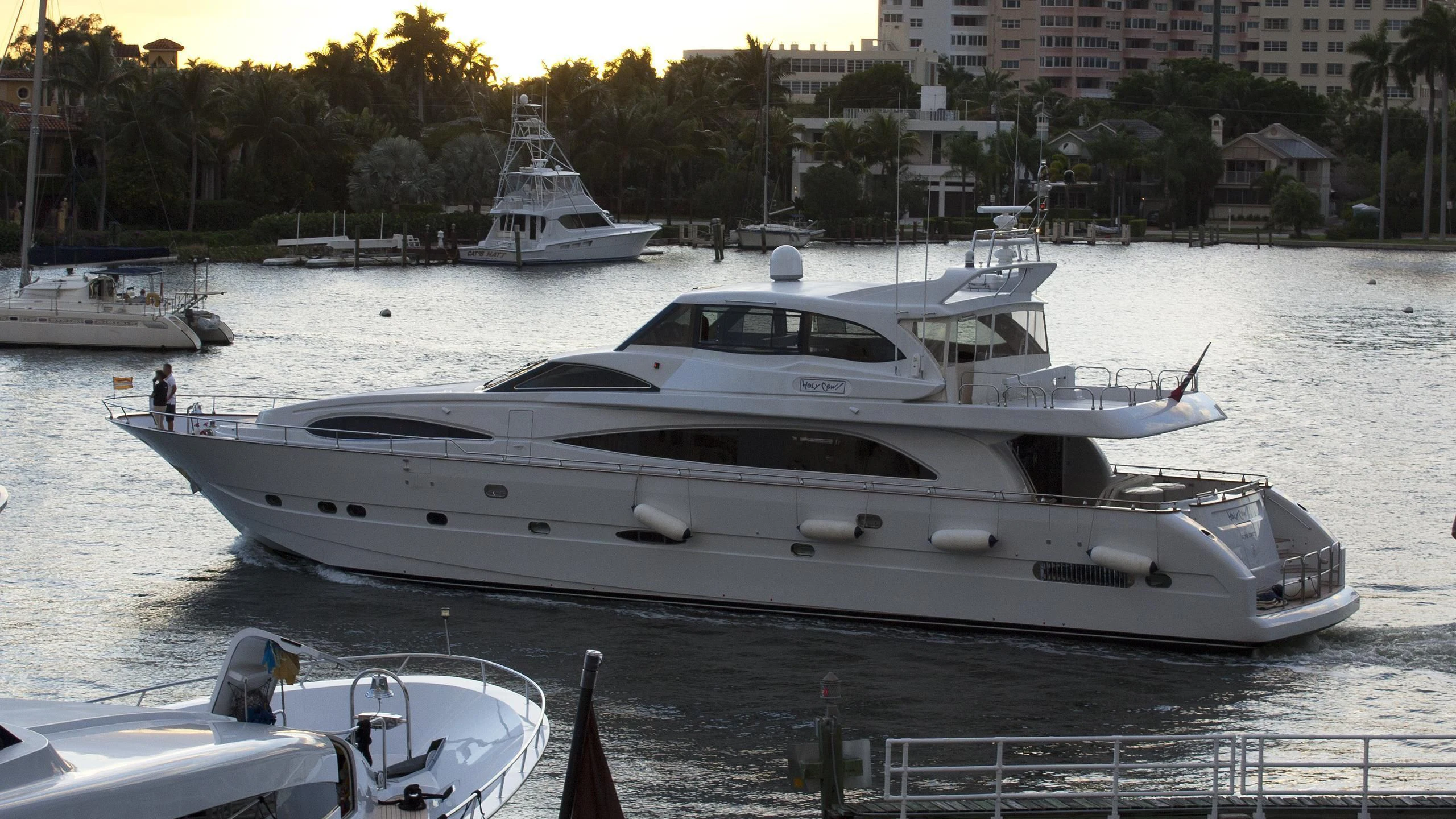 a group of boats on a river aboard CRAZY LOVE Yacht for Sale