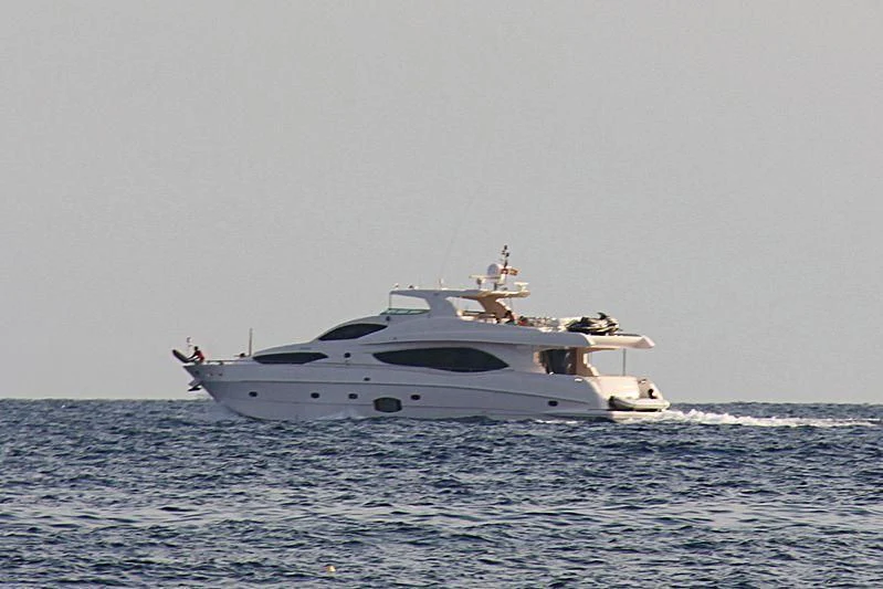 a white yacht in the water aboard NIRVANA Yacht for Sale