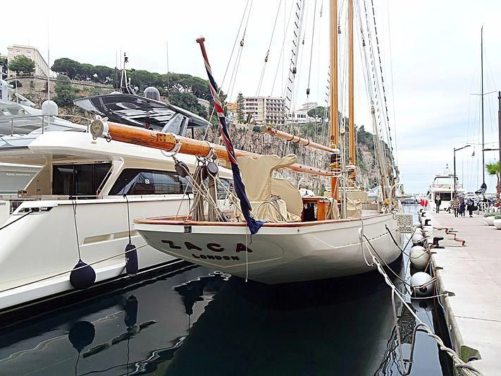 a group of boats are parked in a harbor aboard ZACA Yacht for Sale