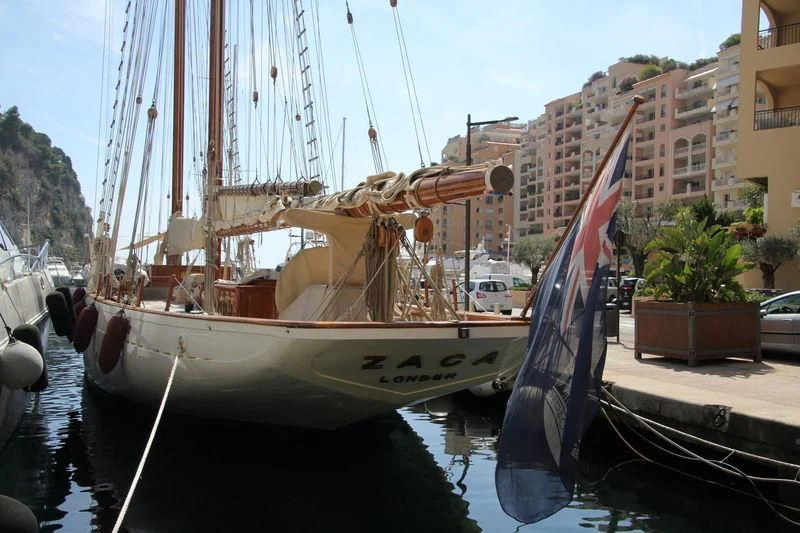 a boat docked in a harbor aboard ZACA Yacht for Sale