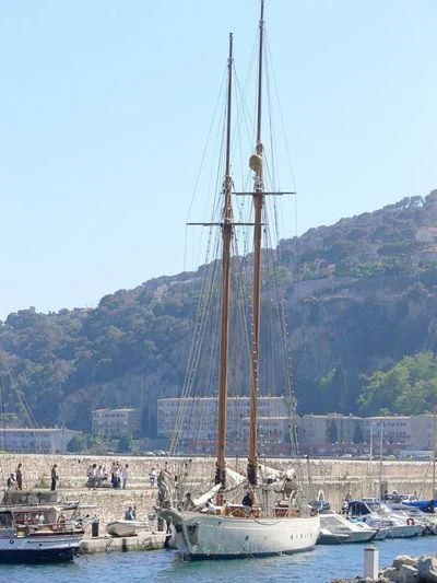 a sailboat in a harbor aboard ZACA Yacht for Sale