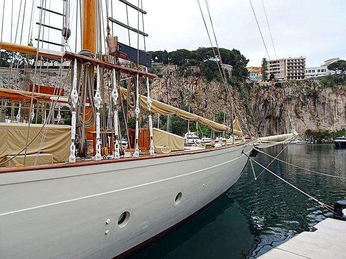 a boat docked in a harbor aboard ZACA Yacht for Sale