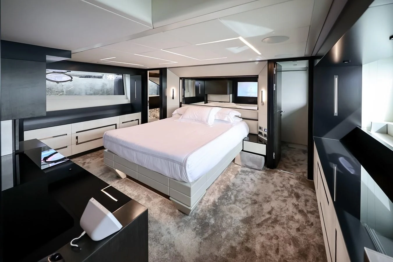 a room with a bed and a tv aboard QUEEN B SPORT Yacht for Sale