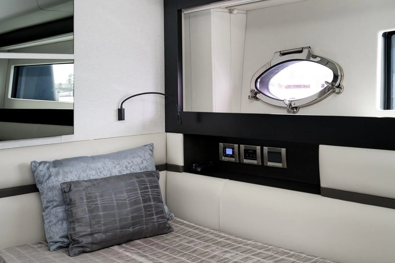 a room with a bed and a television aboard QUEEN B SPORT Yacht for Sale