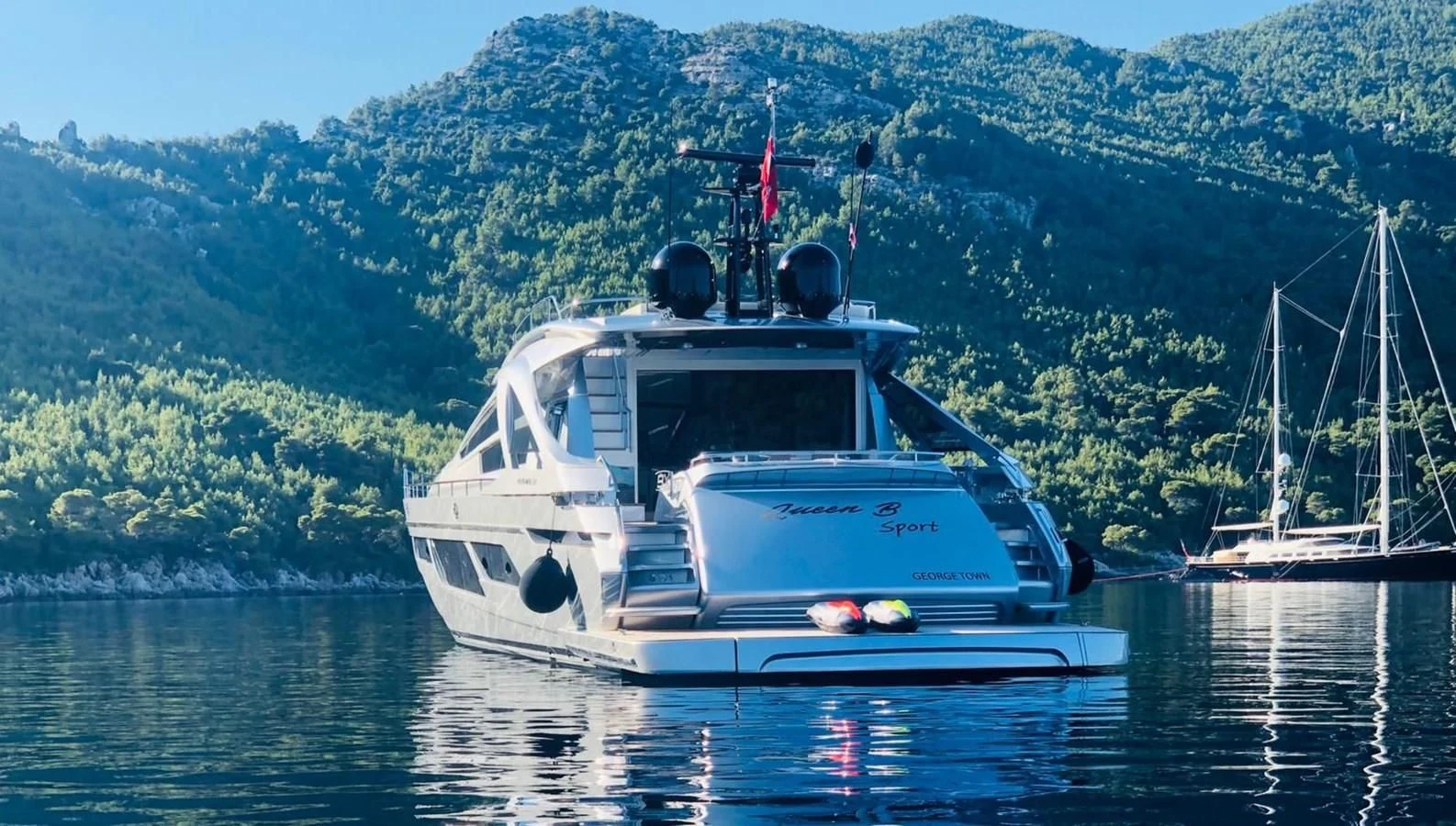 a boat on the water aboard QUEEN B SPORT Yacht for Sale