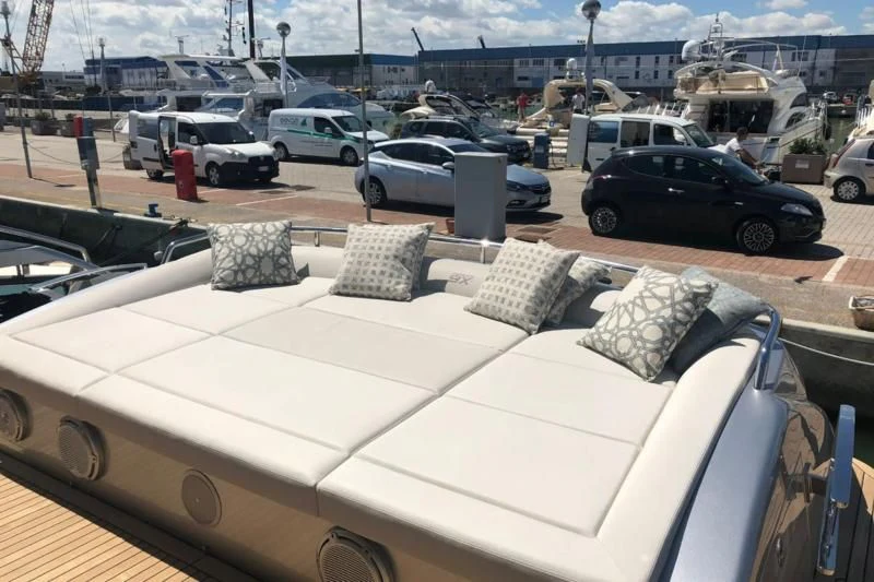 a couch in a parking lot aboard QUEEN B SPORT Yacht for Sale
