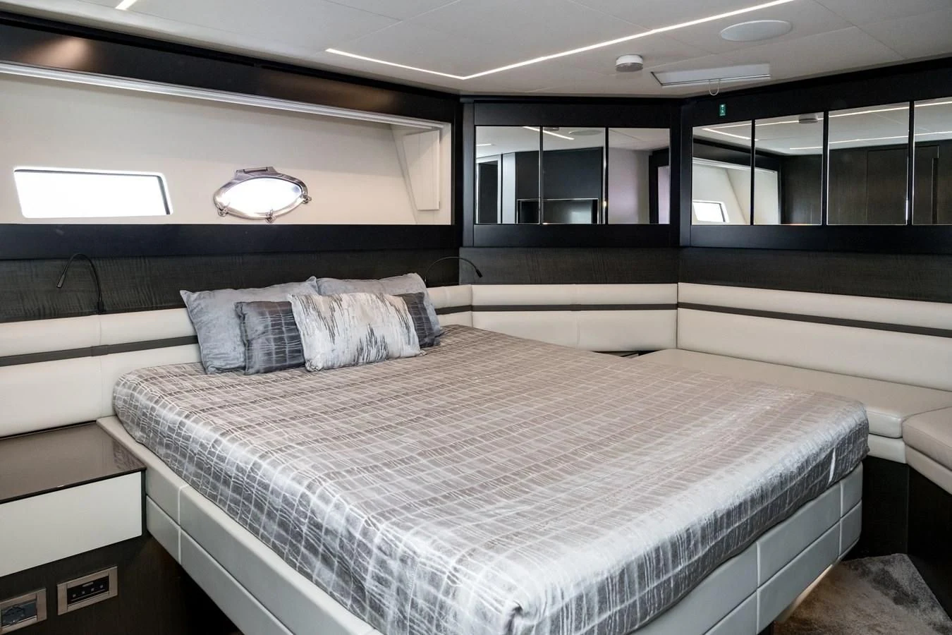 a bed in a room aboard QUEEN B SPORT Yacht for Sale