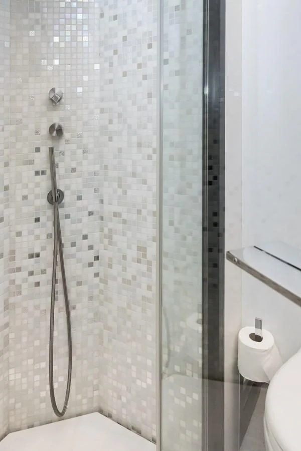 a shower with a shower head aboard QUEEN B SPORT Yacht for Sale