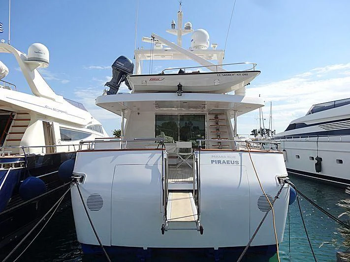 a large white boat with a blue rope attached to it aboard PANAMA BLUE Yacht for Sale