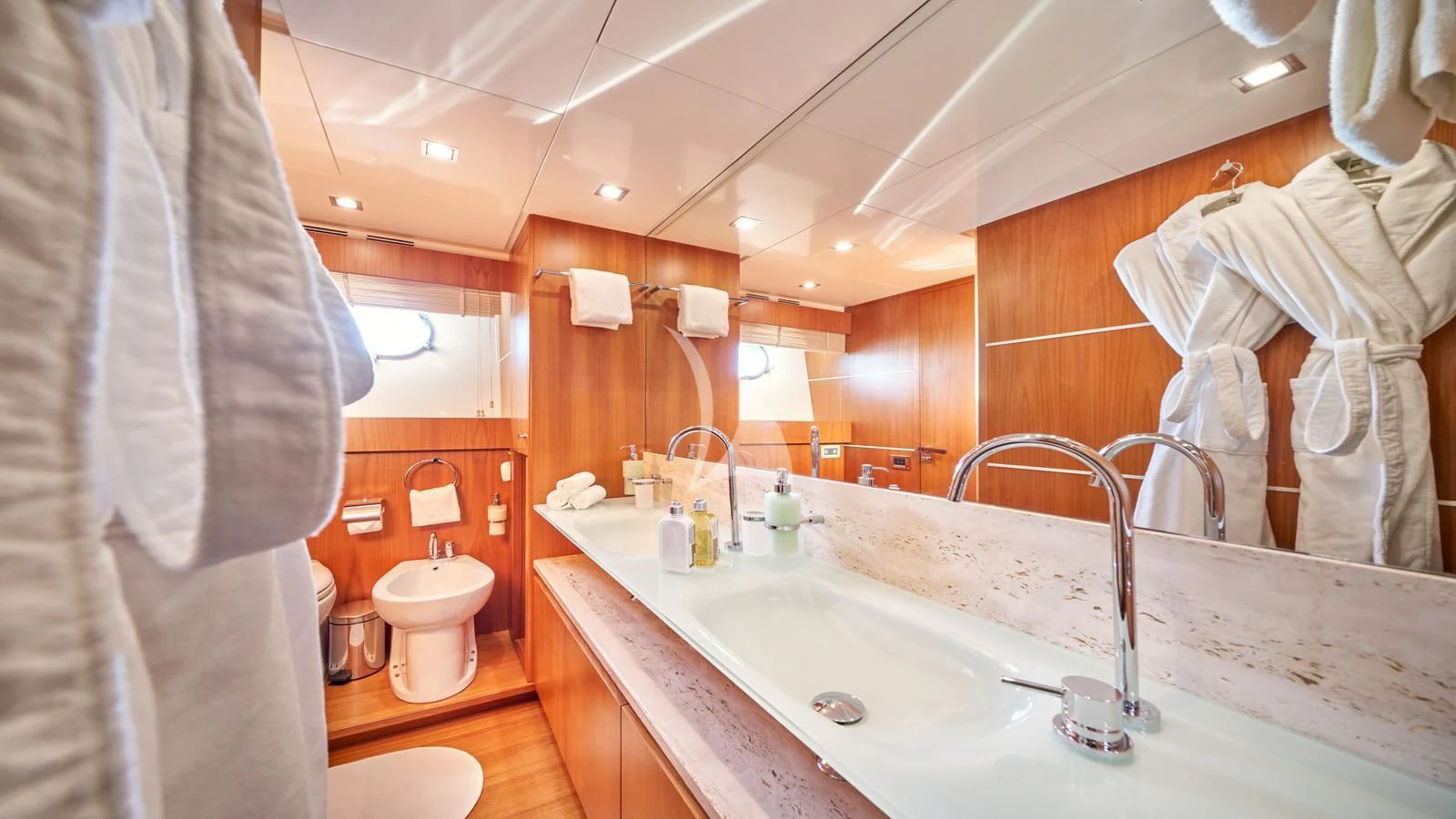 a bathroom with a sink and a toilet aboard KARISMA Yacht for Sale