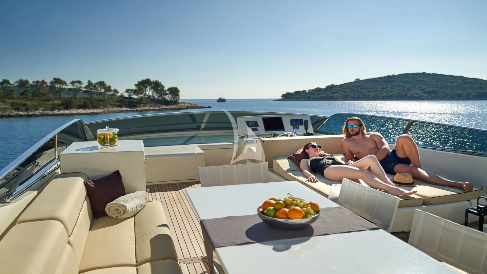 a couple of people on a boat aboard KARISMA Yacht for Sale