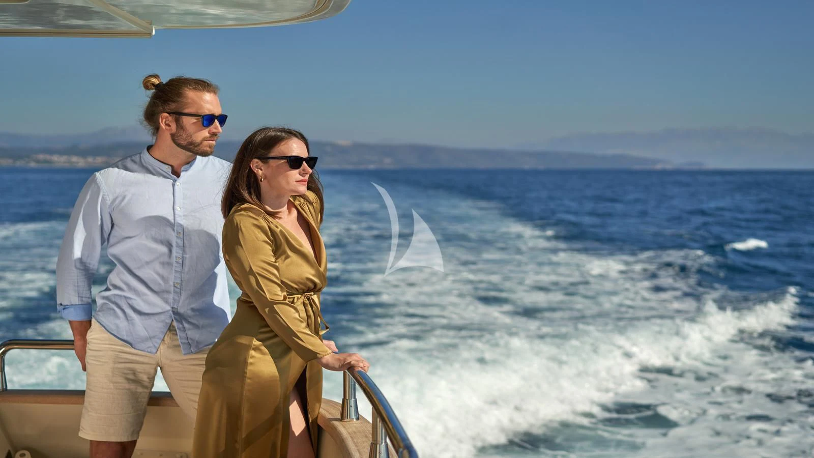 a man and woman on a boat aboard KARISMA Yacht for Sale