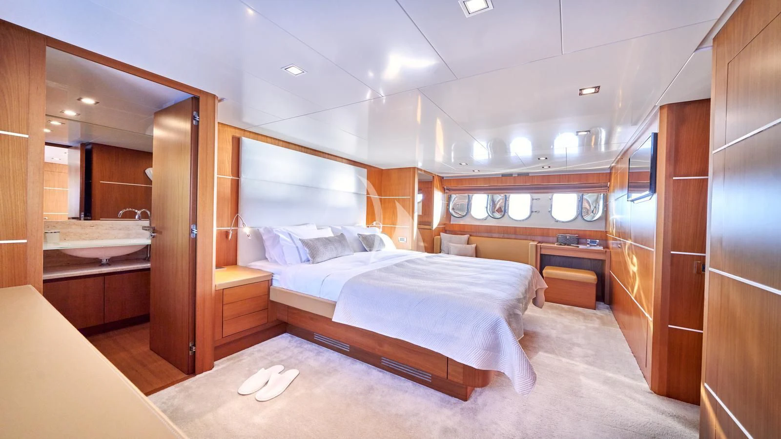 a room with a couple of beds aboard KARISMA Yacht for Sale