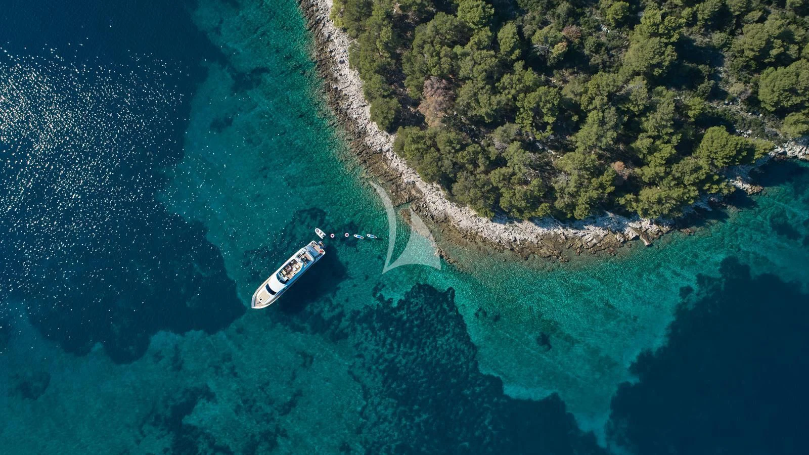 a boat sailing in the sea aboard KARISMA Yacht for Sale