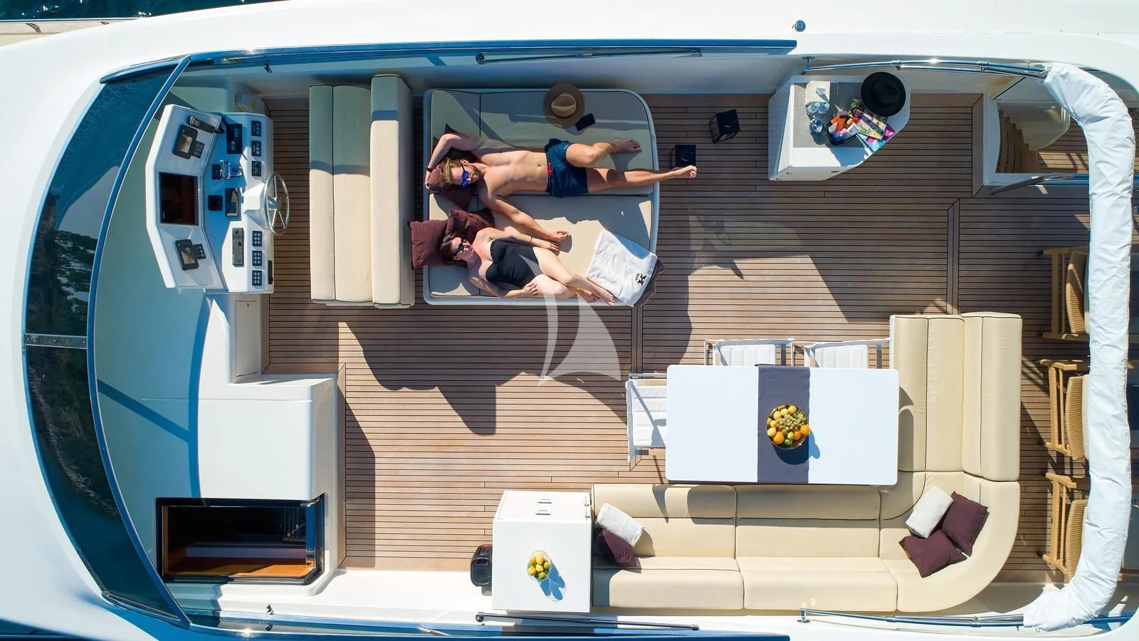a group of people in a room aboard KARISMA Yacht for Sale
