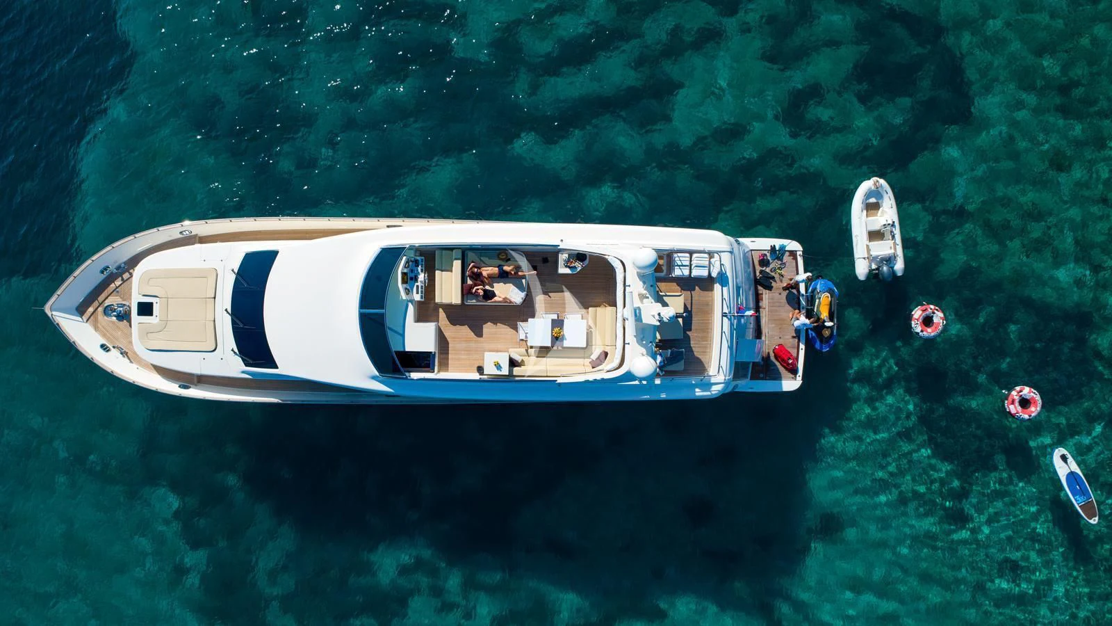 a group of people in a boat aboard KARISMA Yacht for Sale