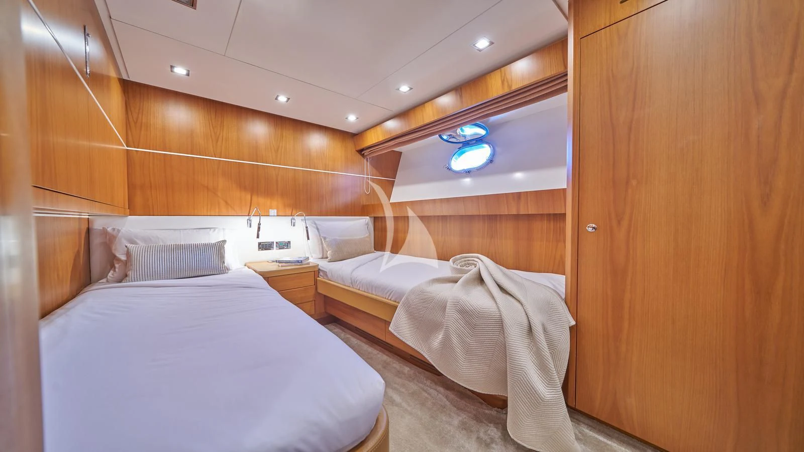 a room with two beds aboard KARISMA Yacht for Sale