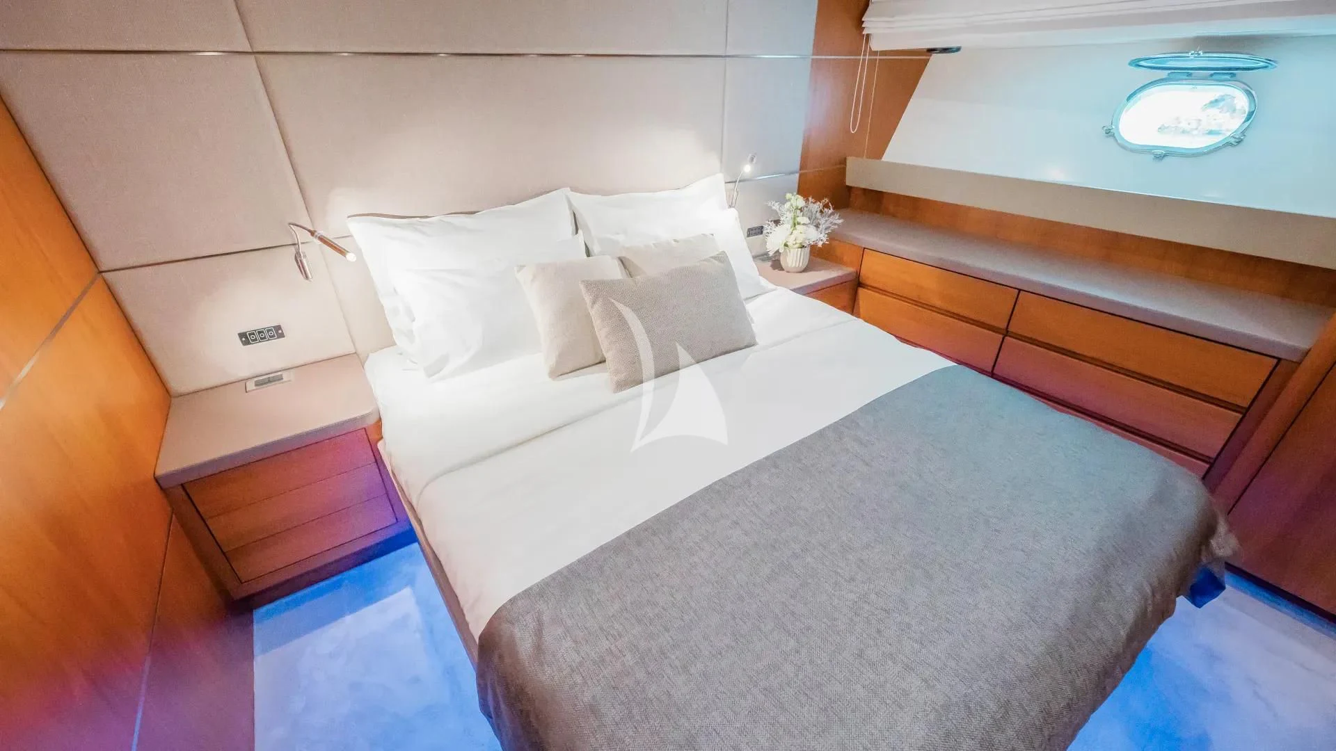 a bed with white sheets aboard KARISMA Yacht for Sale