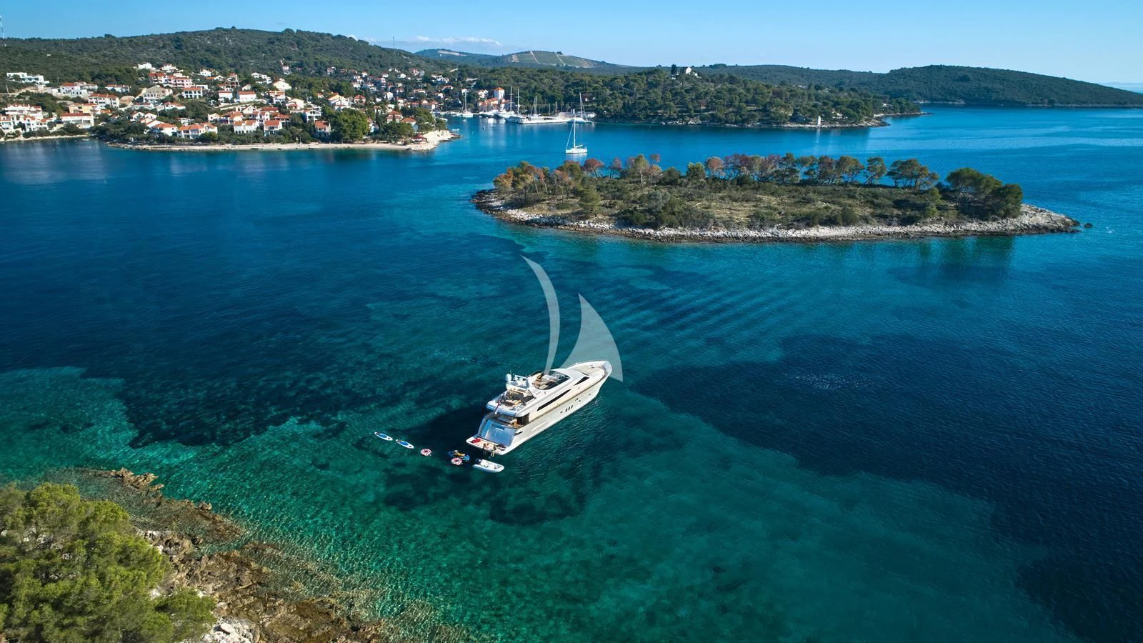 a boat sailing on the water aboard KARISMA Yacht for Sale