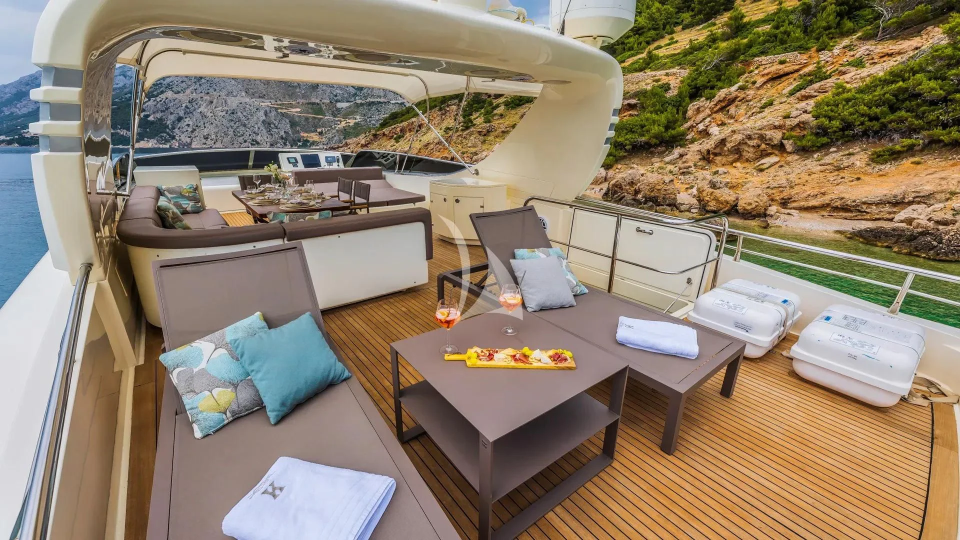 a room with a table and chairs aboard KARISMA Yacht for Sale