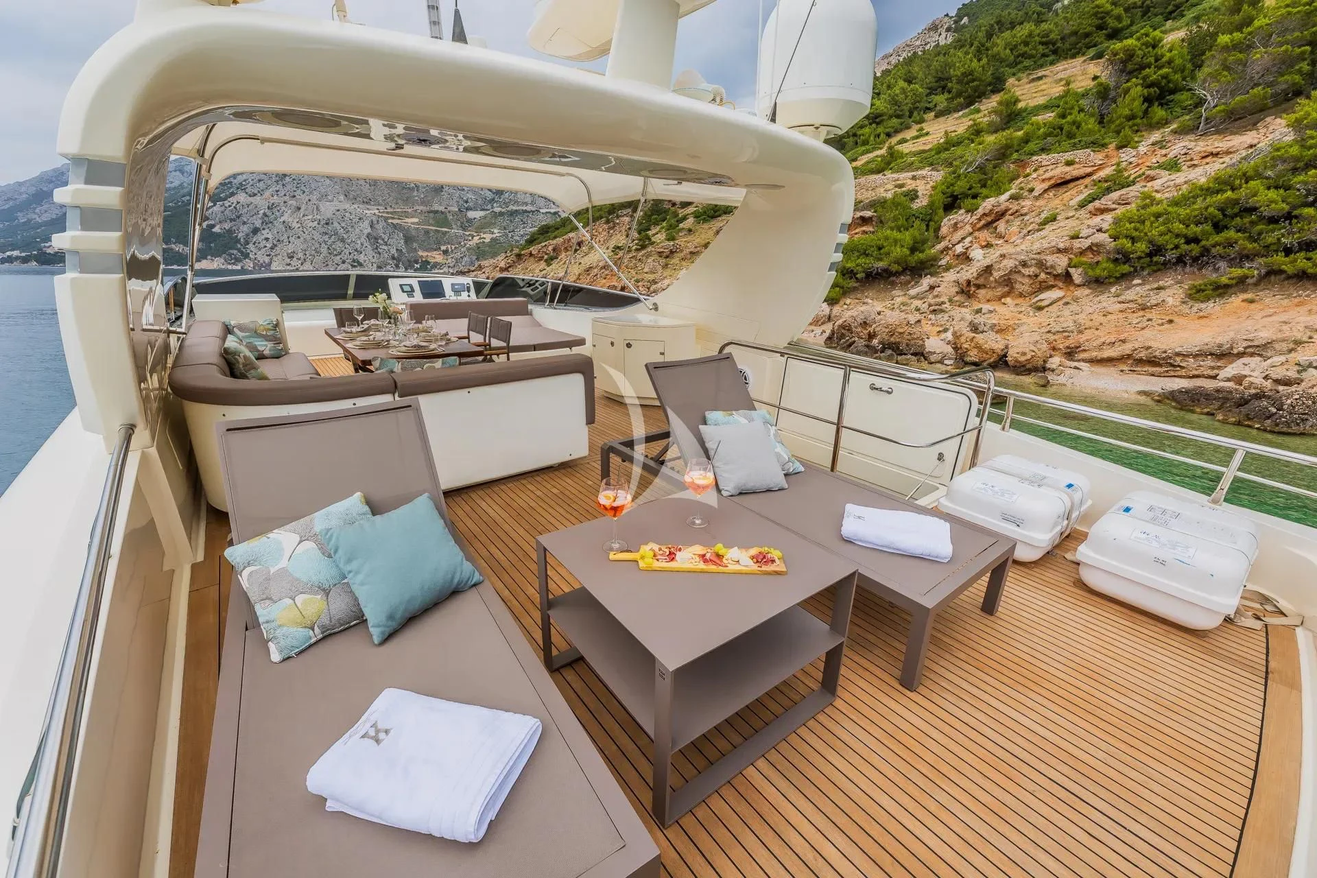a room with a table and chairs aboard KARISMA Yacht for Sale