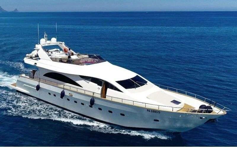 a white yacht in the water aboard JAUNI Yacht for Sale
