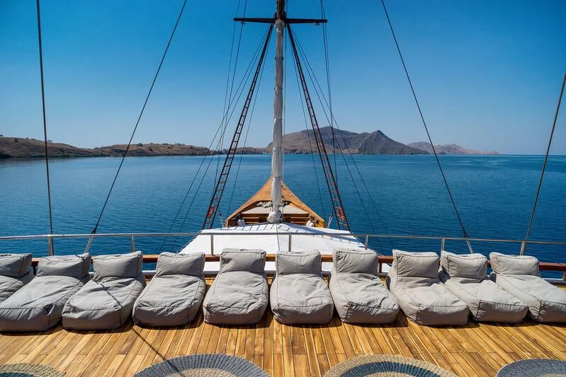a boat on a dock aboard PRANA Yacht for Charter