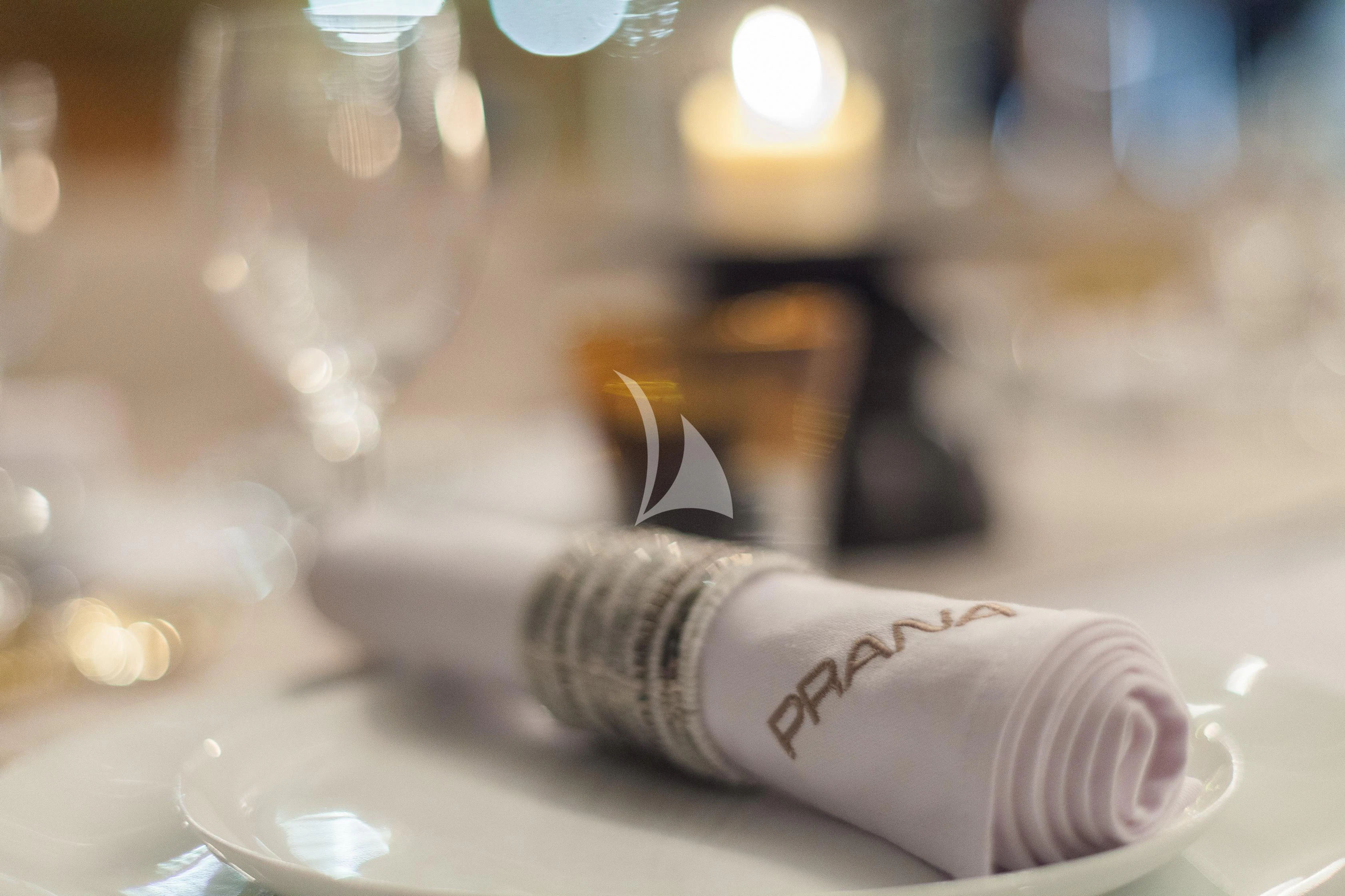 a bottle of champagne aboard PRANA Yacht for Charter