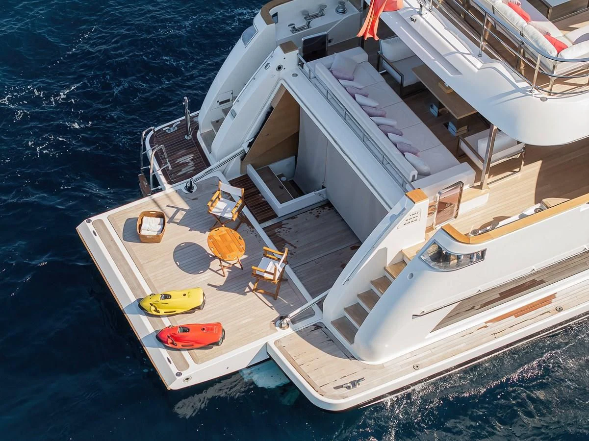 a large white boat on the water aboard NO SAUCE Yacht for Sale