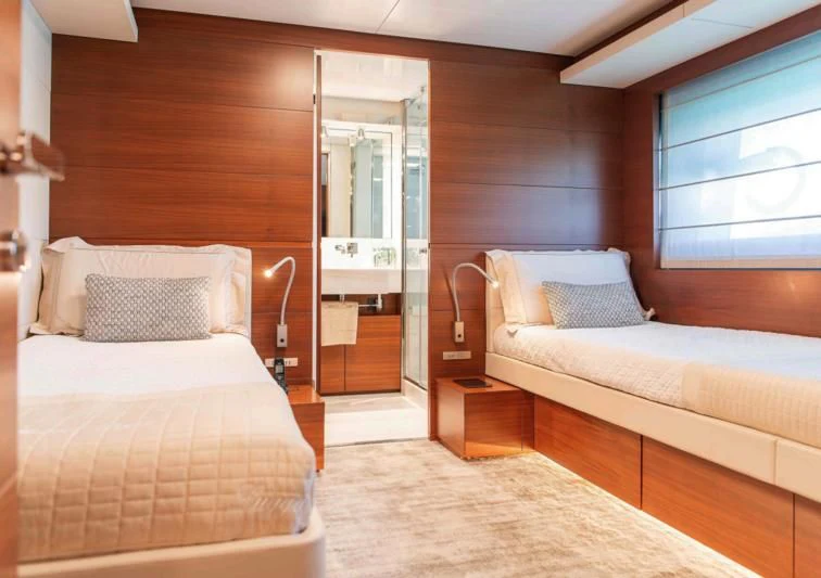 a room with two beds aboard NO SAUCE Yacht for Sale