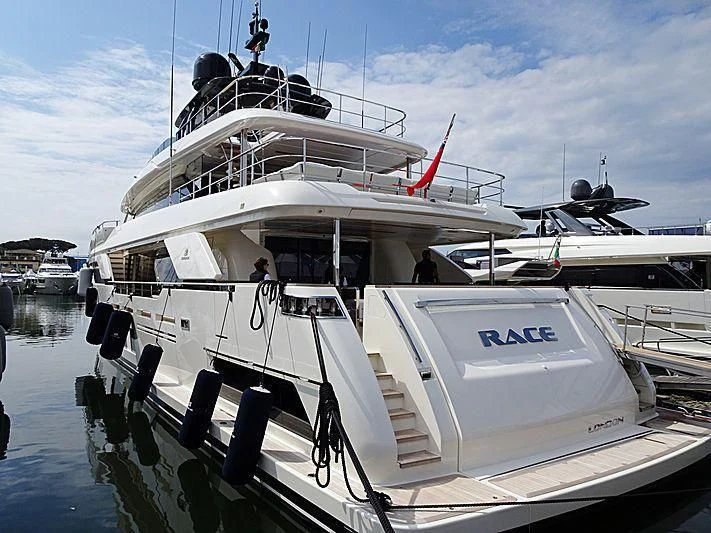 a boat docked at a pier aboard NO SAUCE Yacht for Sale