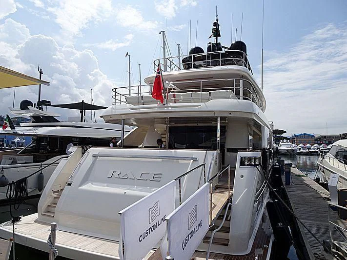 a large white boat docked aboard NO SAUCE Yacht for Sale