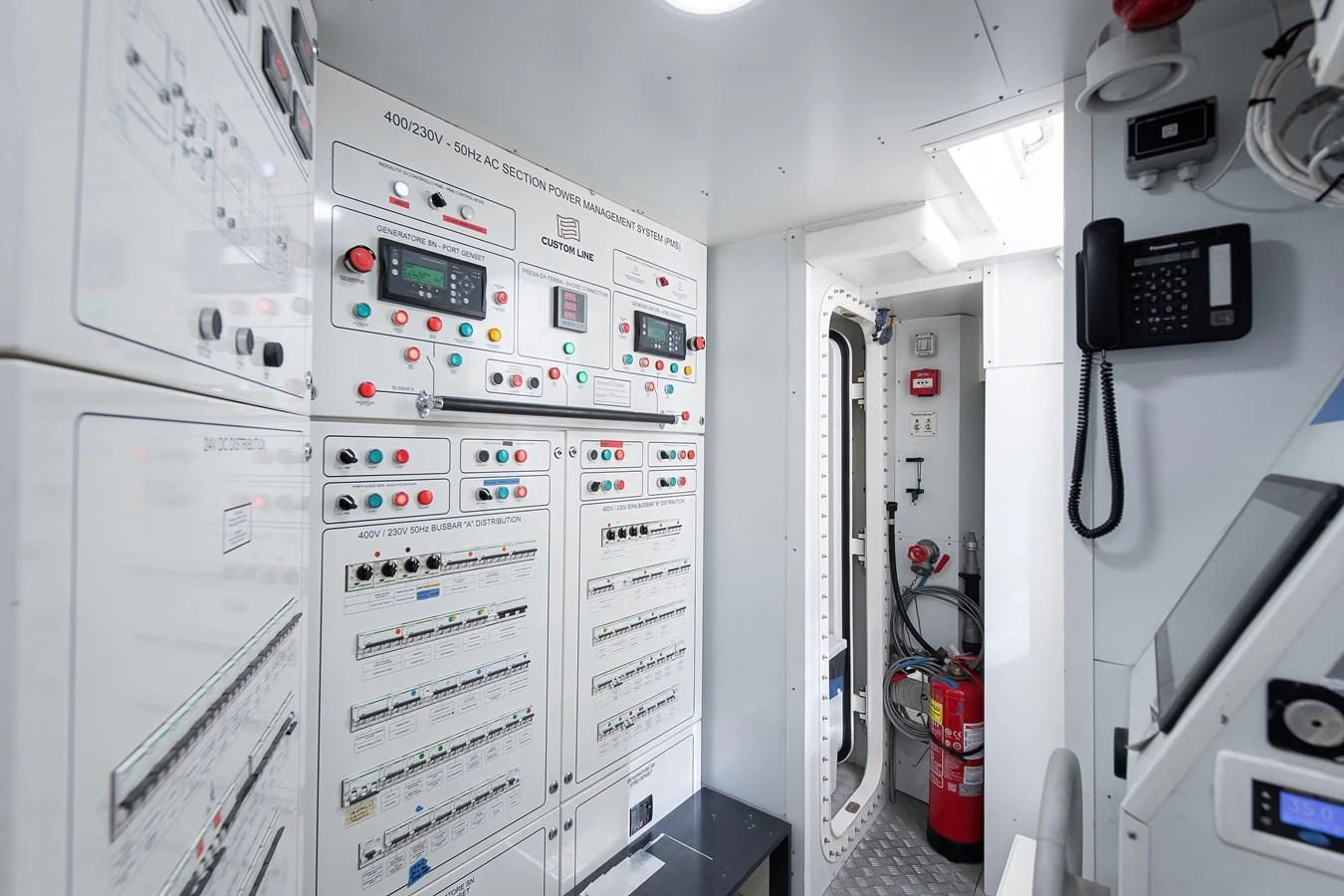 a room with white machines aboard NO SAUCE Yacht for Sale